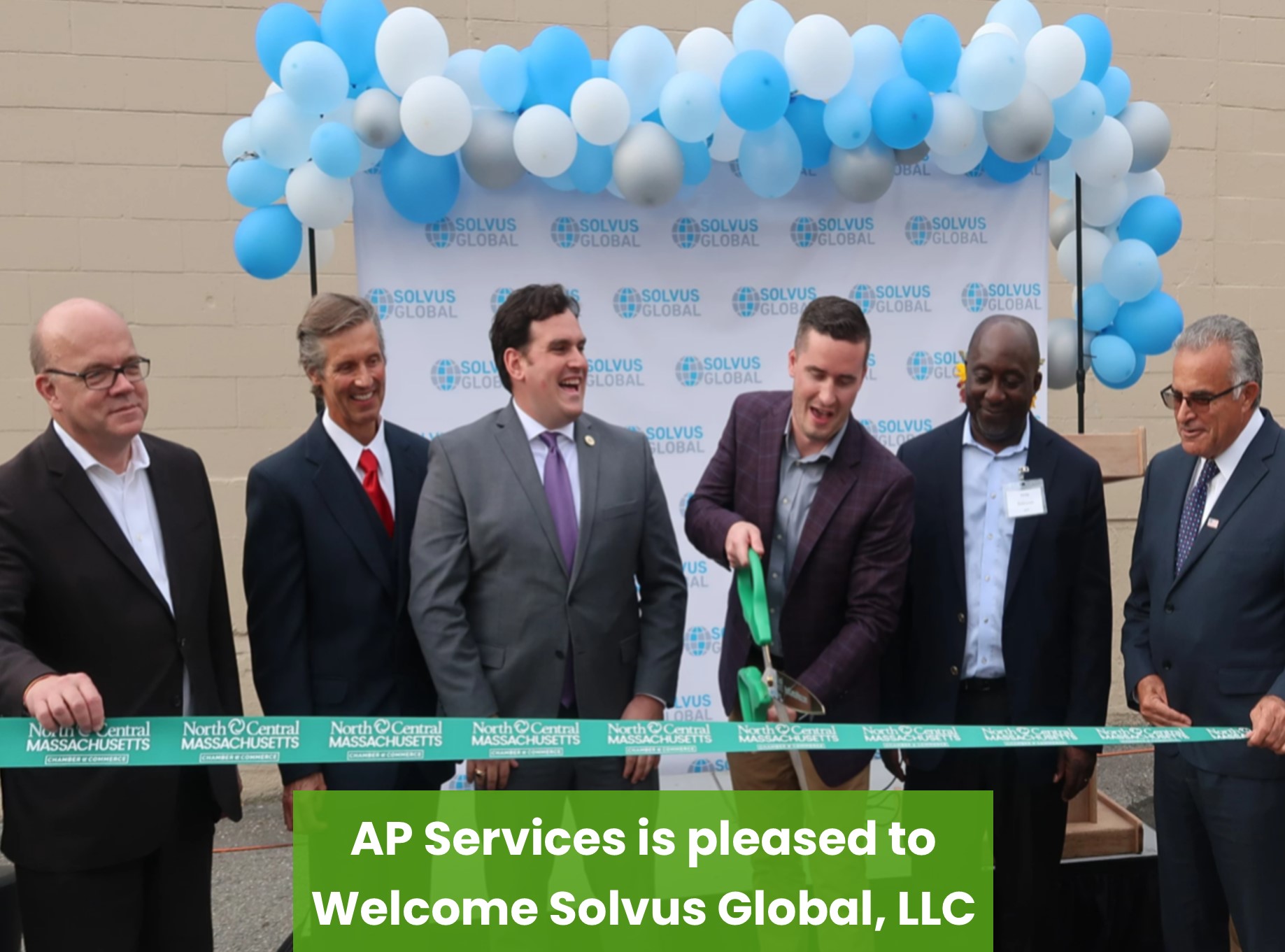 Picture of ribbon cutting with headline AP Services Welcomes Solvus Global