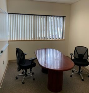 Small Conference Room with desk and chairs